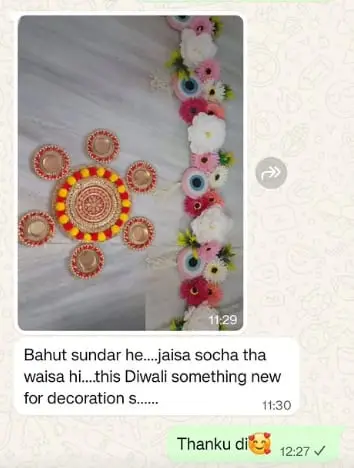 Customer photo of rangoli and toran, with the message: bahut sundar he, jaisa socha tha waisa hi