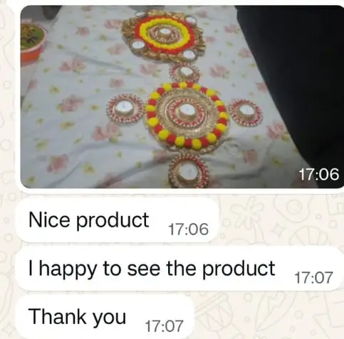 Customer photo of rangoli, with the messages: nice product, I am happy to see the product