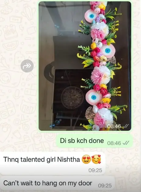 Photo of a floral evil-eye toran, with the customer messages: talented girl, cannot wait to hang it on my door